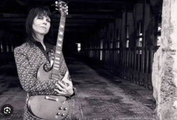 For nearly two decades, Seattle guitarist Kathy Moore has been a go-to guitarist with her talents ranging from rock to funk to jazz and country. She is a studio musician, arranger, multi-instrumentalist and teacher who performs in many theater projects, and local bands. She has also performed with the likes of Thaddeus Turner (Maktub), Mike McCready (Pearl Jam, Mad Season, Flight To Mars), the band Brad, Crystal Beth and the Boom Boom Band, Shawn Smith, Kim Virant, Grace Love, Wayne Horvitz, Ben Smith, Barrett Martin, Stone Gossard among other respected musicians– she has also played for theater productions such as Passing Strange, Soft Rock Kid, Naked Mole Rat Gets Dressed, Alien Angel, Houses of the Unholy, Operation Mindcrime and many more.